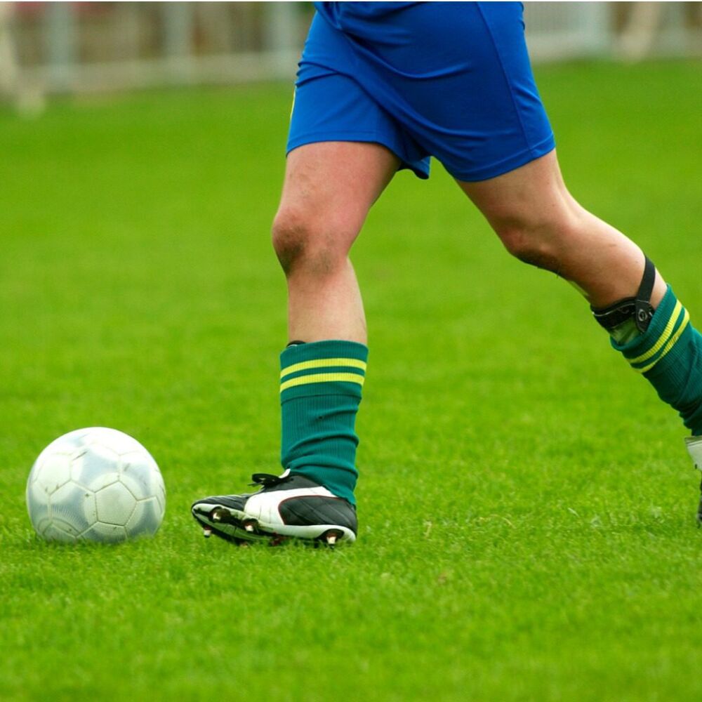 Soccer player enjoying pain-free game with optimal performance